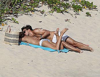 Olivia Palermo sunbathing without bra on the beach in St. Barths