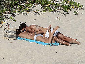 Olivia Palermo sunbathing without bra on the beach in St. Barths