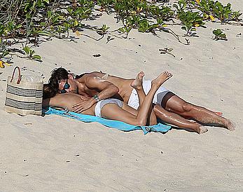 Olivia Palermo sunbathing without bra on the beach in St. Barths