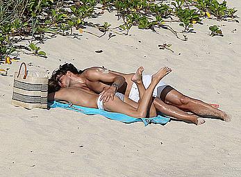 Olivia Palermo sunbathing without bra on the beach in St. Barths