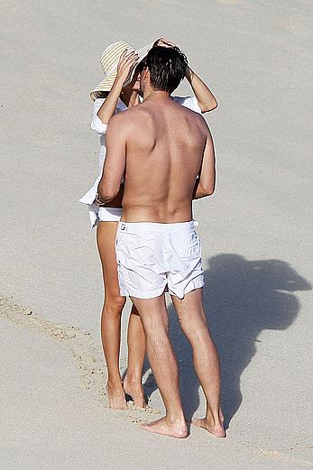 Olivia Palermo sunbathing without bra on the beach in St. Barths