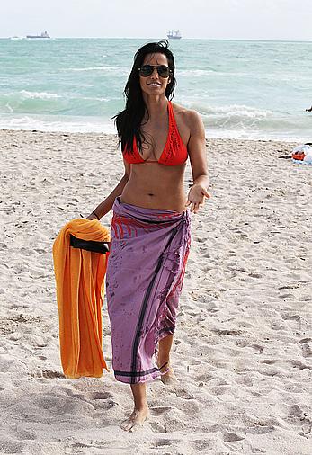 Indian actress Padma Lakshmi hard nipples under red bikini in Miami