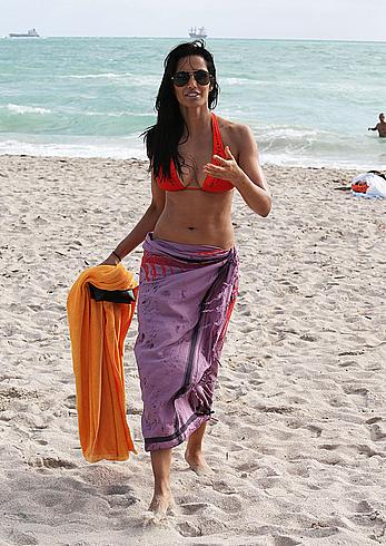 Indian actress Padma Lakshmi hard nipples under red bikini in Miami