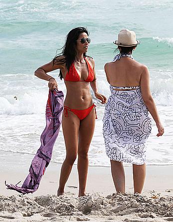 Indian actress Padma Lakshmi hard nipples under red bikini in Miami