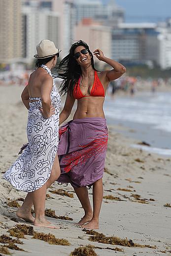 Indian actress Padma Lakshmi hard nipples under red bikini in Miami