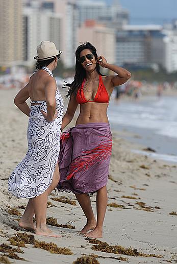 Indian actress Padma Lakshmi hard nipples under red bikini in Miami