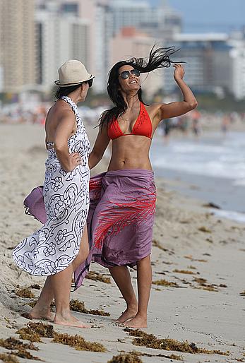 Indian actress Padma Lakshmi hard nipples under red bikini in Miami