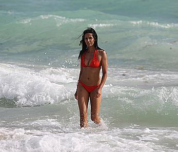 Indian actress Padma Lakshmi hard nipples under red bikini in Miami