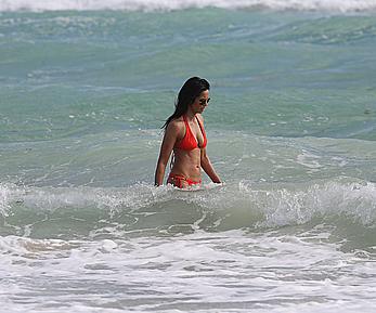 Indian actress Padma Lakshmi hard nipples under red bikini in Miami