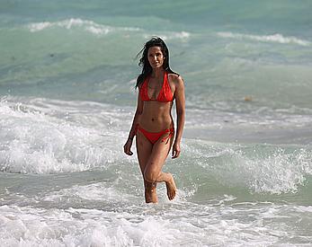 Indian actress Padma Lakshmi hard nipples under red bikini in Miami