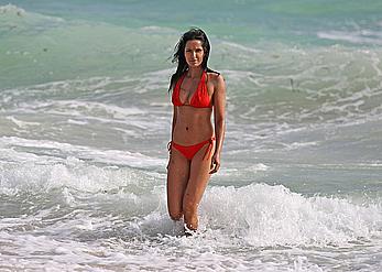 Indian actress Padma Lakshmi hard nipples under red bikini in Miami