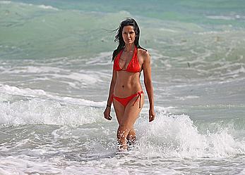 Indian actress Padma Lakshmi hard nipples under red bikini in Miami