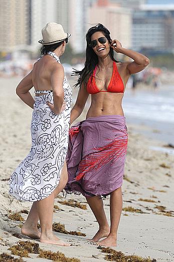 Indian actress Padma Lakshmi hard nipples under red bikini in Miami