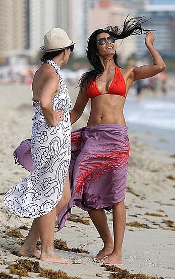 Indian actress Padma Lakshmi hard nipples under red bikini in Miami