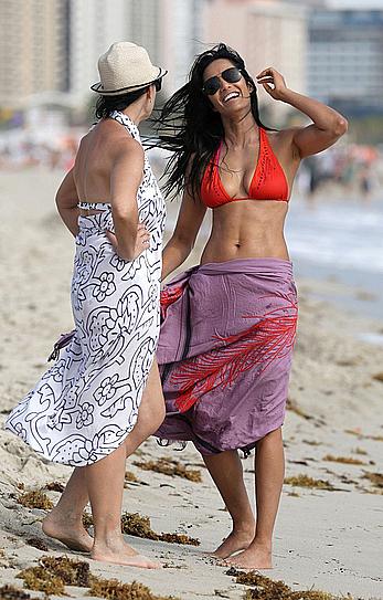 Indian actress Padma Lakshmi hard nipples under red bikini in Miami