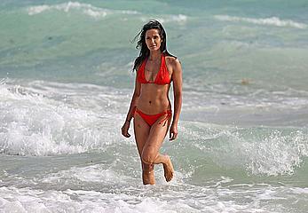 Indian actress Padma Lakshmi hard nipples under red bikini in Miami