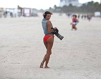 Paparazzo Logan Fazio poses in a bikini on Miami Beach