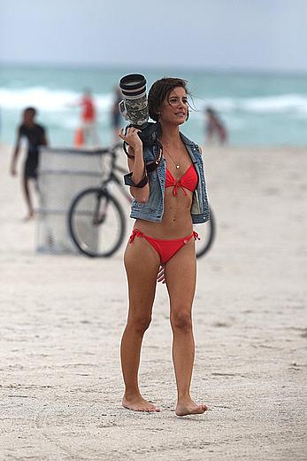 Paparazzo Logan Fazio poses in a bikini on Miami Beach