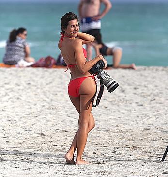 Paparazzo Logan Fazio poses in a bikini on Miami Beach