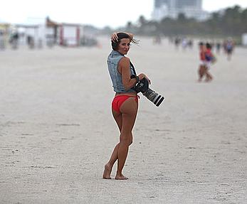 Paparazzo Logan Fazio poses in a bikini on Miami Beach