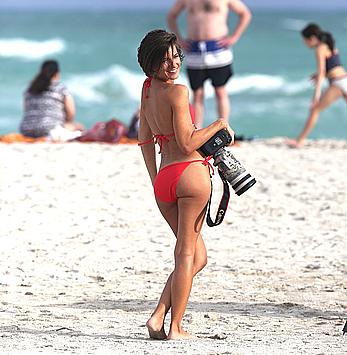 Paparazzo Logan Fazio poses in a bikini on Miami Beach