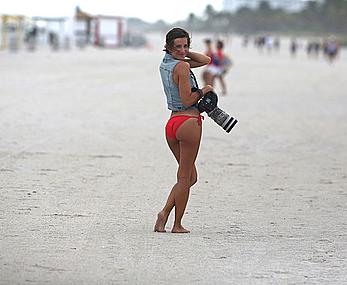 Paparazzo Logan Fazio poses in a bikini on Miami Beach