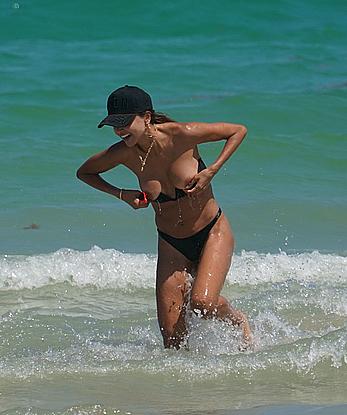 Patricia Contreras boob slip on the beach in Miami