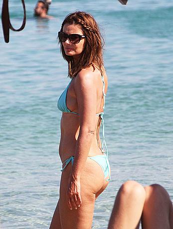 Paulina Porizkova sexy in blue bikini on vacation