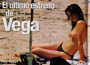 Paz Vega sunbathing topless on a beach