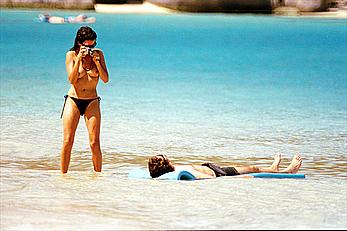 Spanish actress Penelope Cruz topless at a beach with camera in Virgin Islands