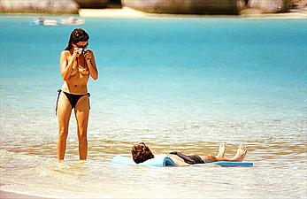 Spanish actress Penelope Cruz topless at a beach with camera in Virgin Islands