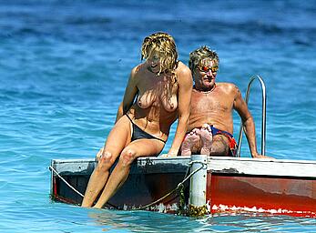 Penny Lancaster topless with Rod Stewart