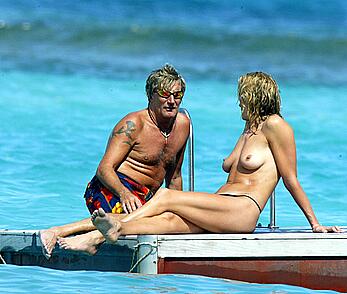 Penny Lancaster topless with Rod Stewart