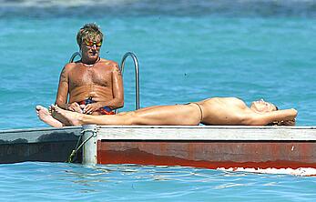 Penny Lancaster topless with Rod Stewart