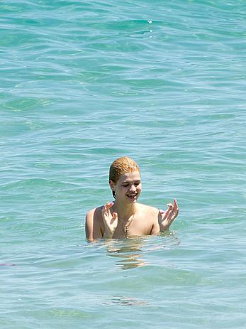 Pixie Geldof caught topless on the Beach in Ibiza