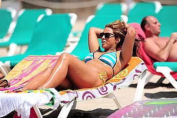 UK Big Brother 11 babe Rachael White in bikini and topless on a beach paparazzi photos