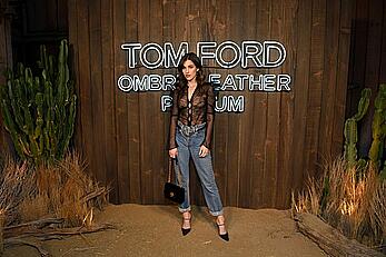 Rainey Qualley braless in see through top at Tom Ford Ombre Leather Parfum Launch in West Hollywood