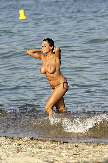 Rebecca Loos topless beach candids in St. Tropez