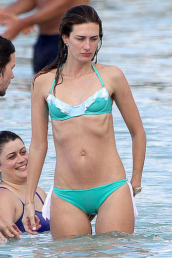 Rhea Durham in blue bikini at the beach in Barbados