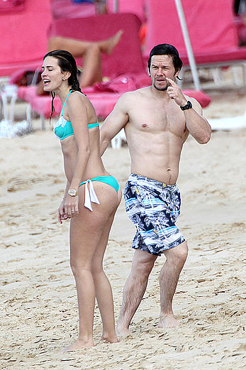 Rhea Durham in blue bikini at the beach in Barbados