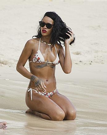 Rihanna at the beach doing a photo shoot in Barbados