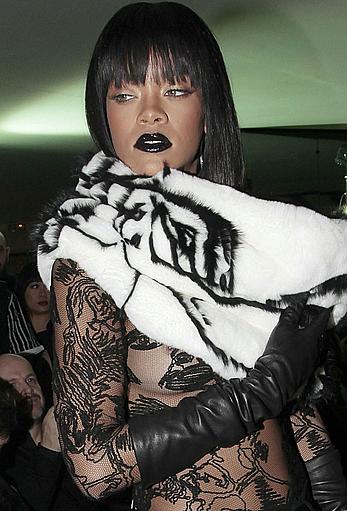 Rihanna nude tits under transparent top Jean Paul Gaultier fashion show in Paris