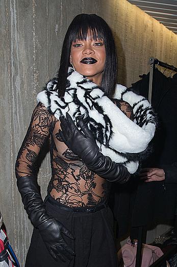 Rihanna nude tits under transparent top Jean Paul Gaultier fashion show in Paris