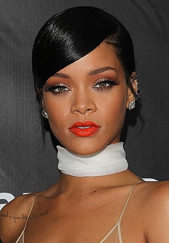 Rihanna covers up her nipples at amfAR LA Inspiration Gala in Hollywood