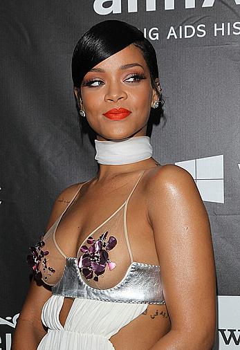 Rihanna covers up her nipples at amfAR LA Inspiration Gala in Hollywood