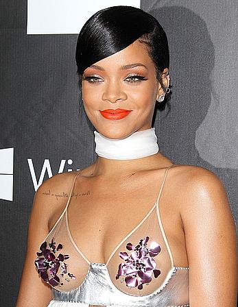 Rihanna covers up her nipples at amfAR LA Inspiration Gala in Hollywood