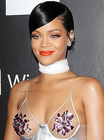 Rihanna covers up her nipples at amfAR LA Inspiration Gala in Hollywood