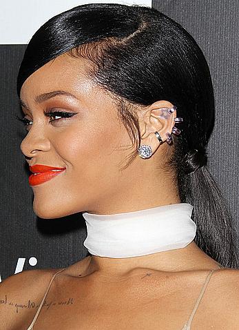 Rihanna covers up her nipples at amfAR LA Inspiration Gala in Hollywood