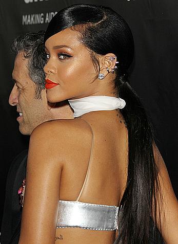 Rihanna covers up her nipples at amfAR LA Inspiration Gala in Hollywood