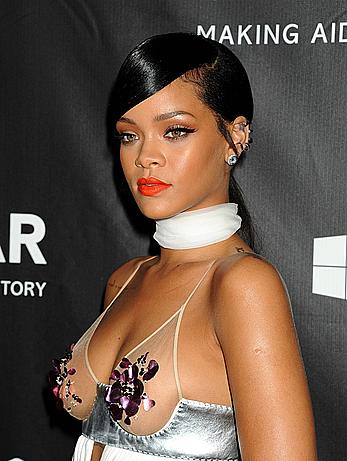 Rihanna covers up her nipples at amfAR LA Inspiration Gala in Hollywood